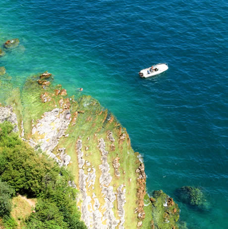 Boat on lake Garda italy photo