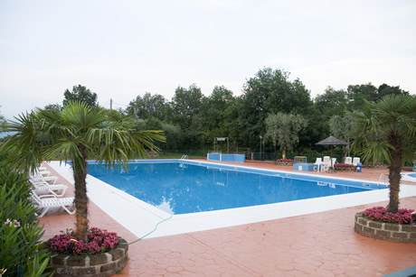 Luxury swimming pool lake Garda photo